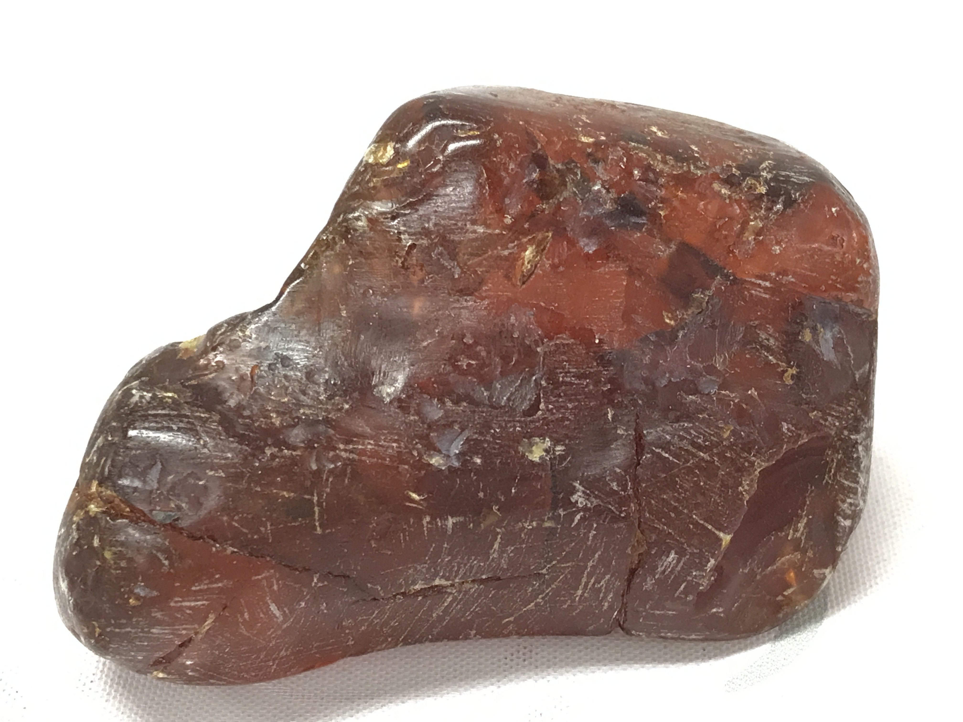 A Baltic amber 70g 3" 8cm long. Postage category A