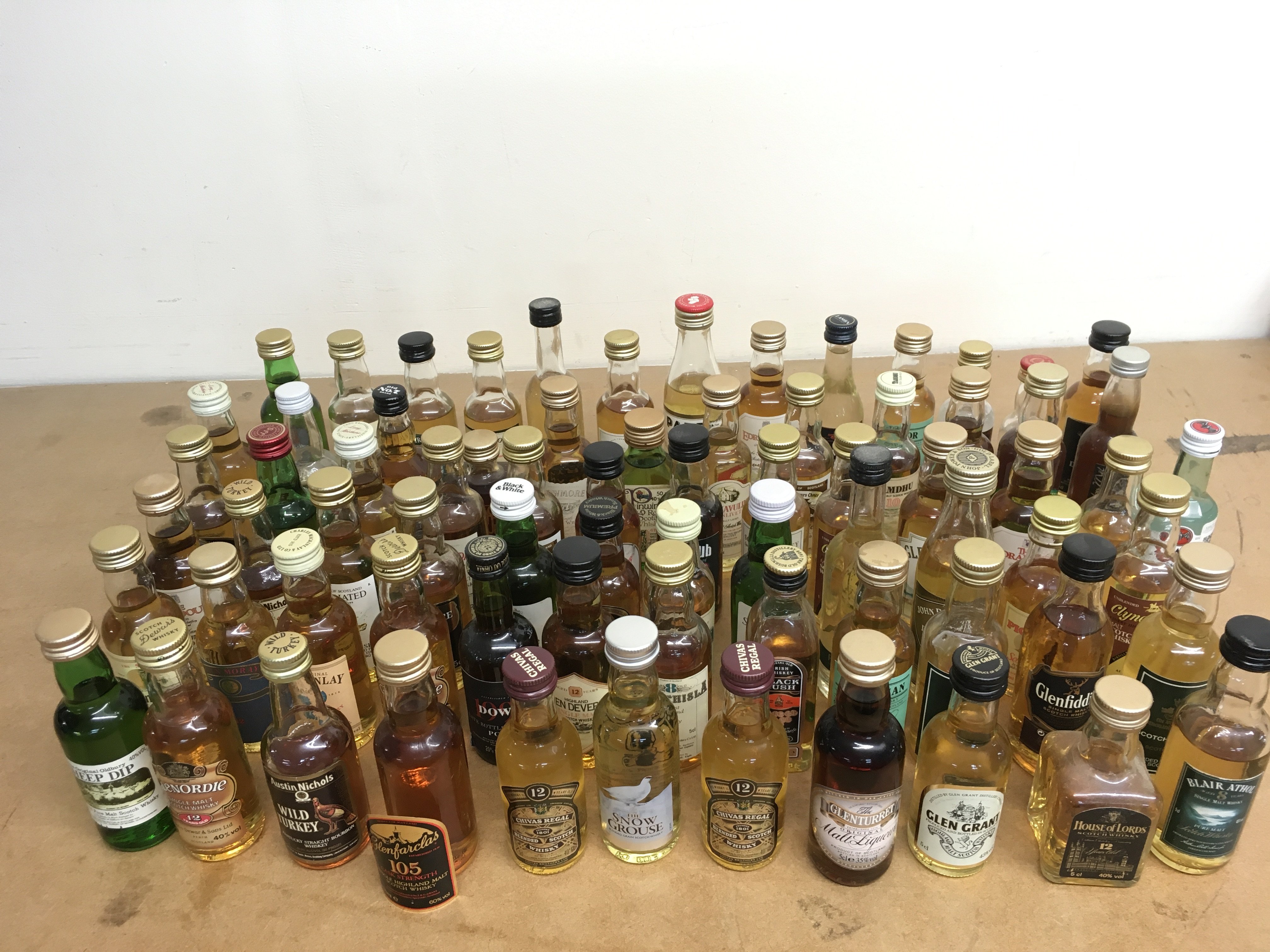 Whiskey miniatures including Chivas Regal, Glenordie, Mackinlay, Glen Moray, House of Lords, Glen Grant, Black and white, The Dalmore etc. this lot cannot be posted
