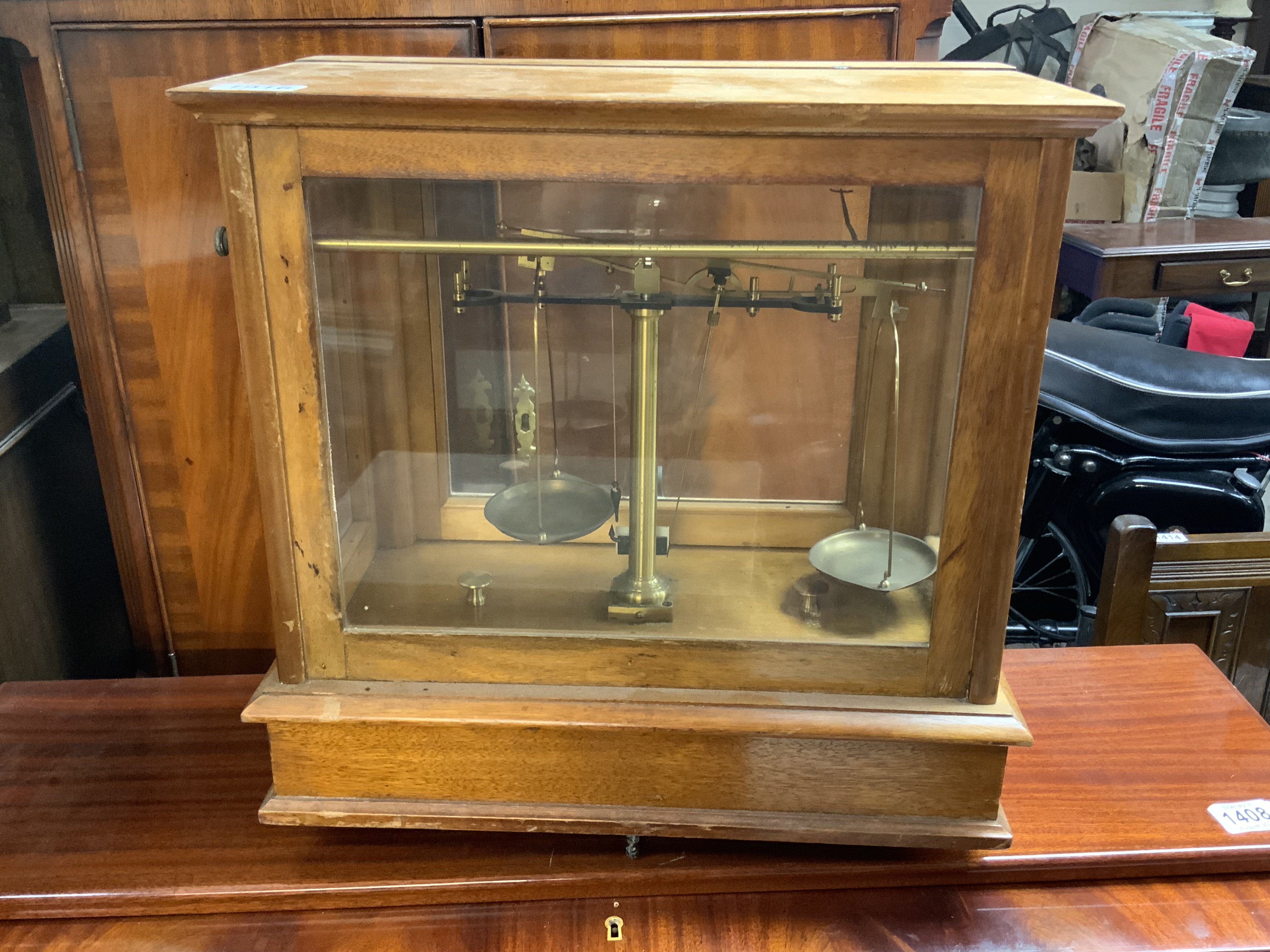 A vintage cased balance scale. 41cm x 43cm x 24cm