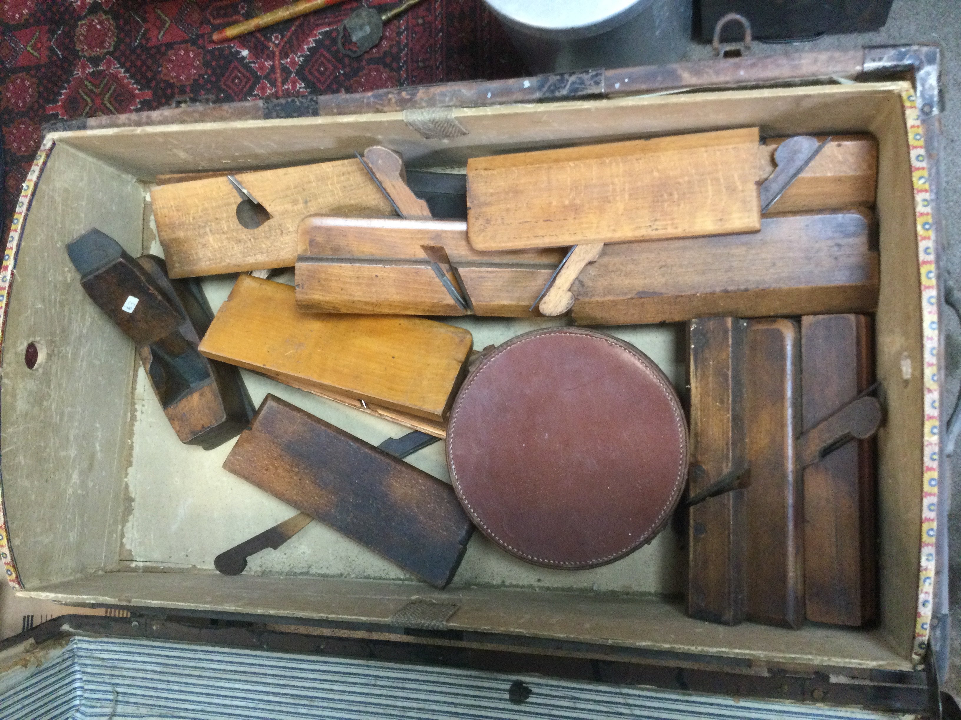 A travelling trunk containing various woodworking tools. Shipping category D.