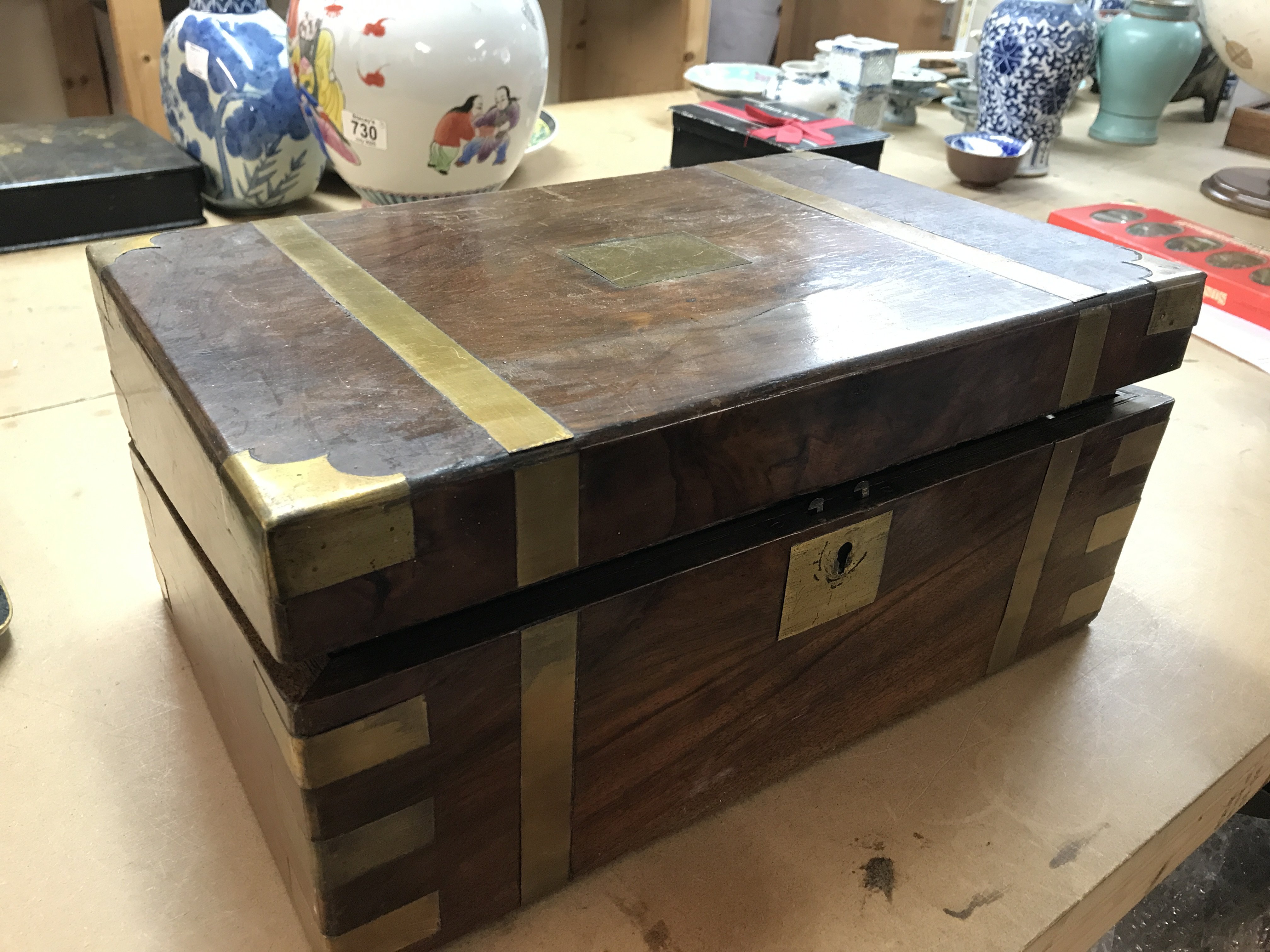 A walnut campaign type writing box, dimensions 25cm long 40cm wide 18cm tall.