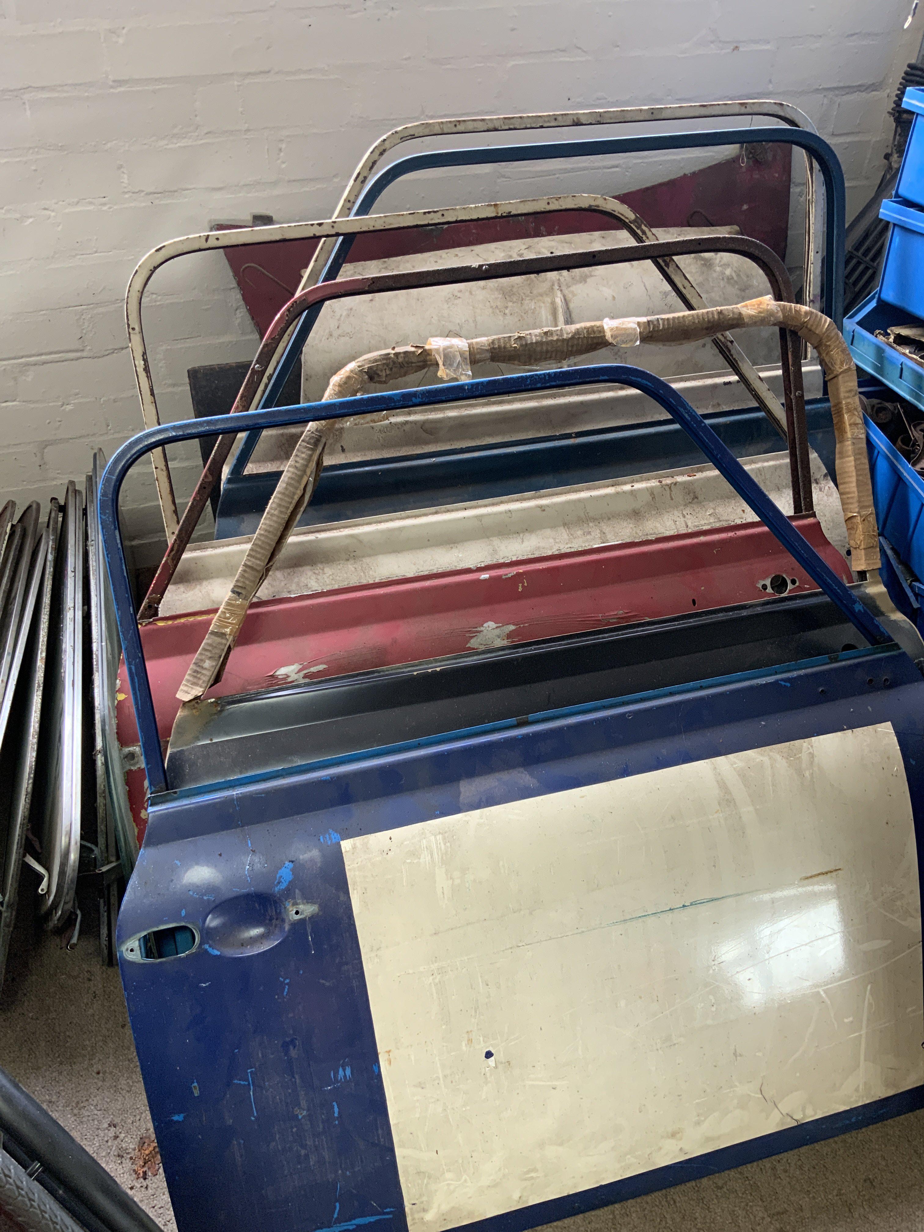 Vintage Mini Cooper parts, body parts to include doors, trunk lids, chrome mounted windows, bonnet lids, chrome bumpers. ( including some light weight racing examples.