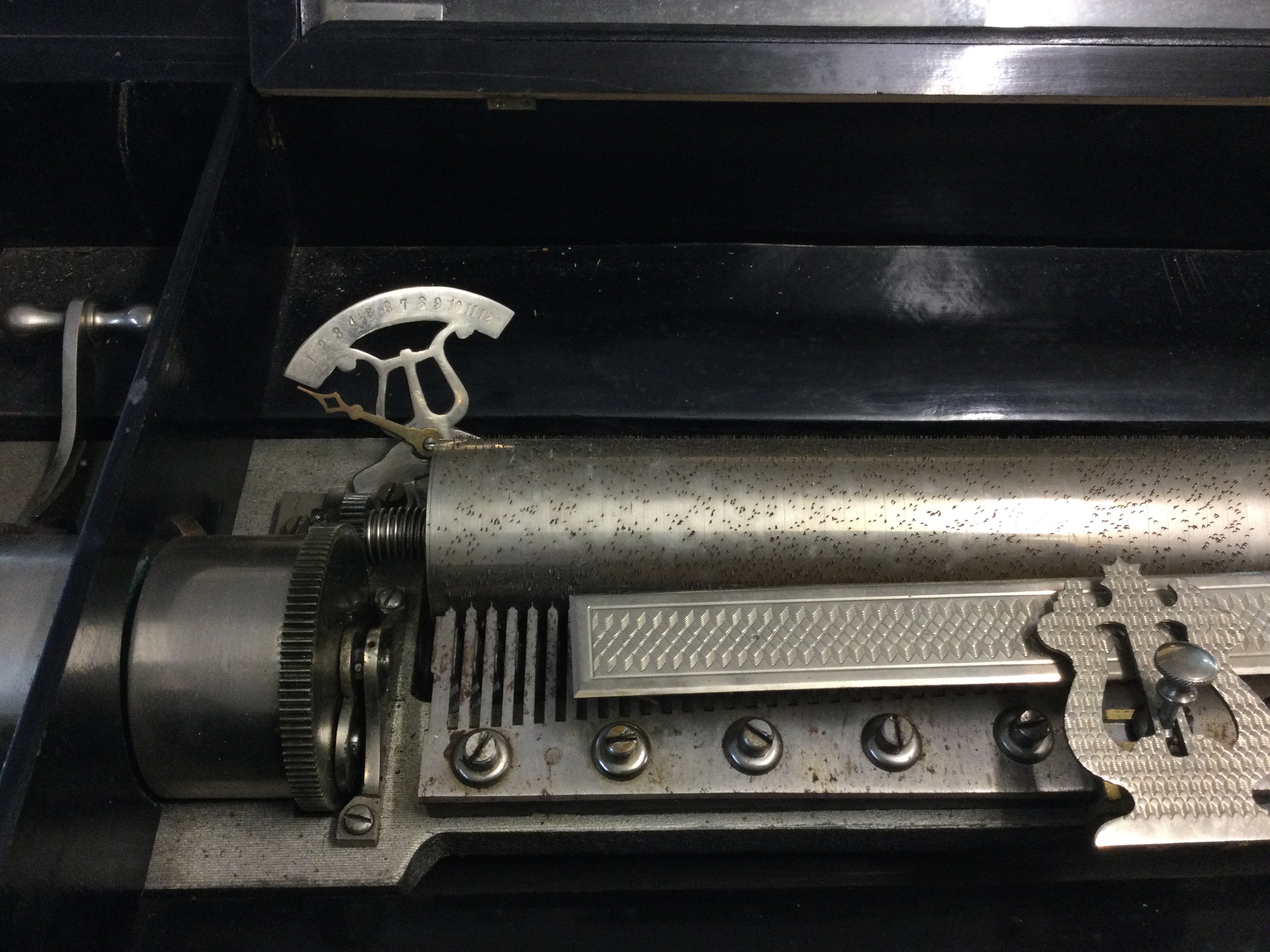 A Victorian 12 aire music box with later decoration.