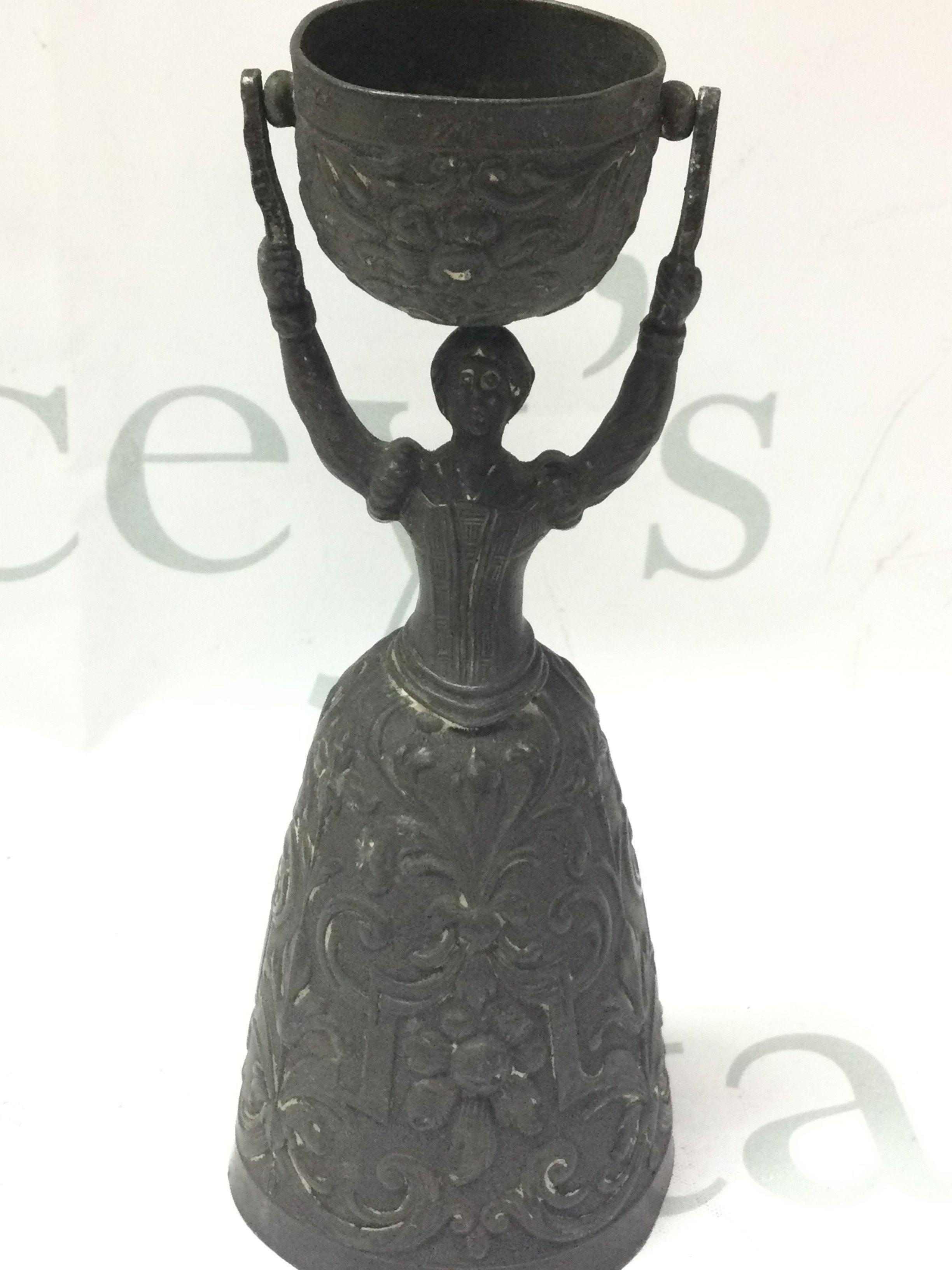 A bronzed wager cup, 16.5cm tall. Postage category B
