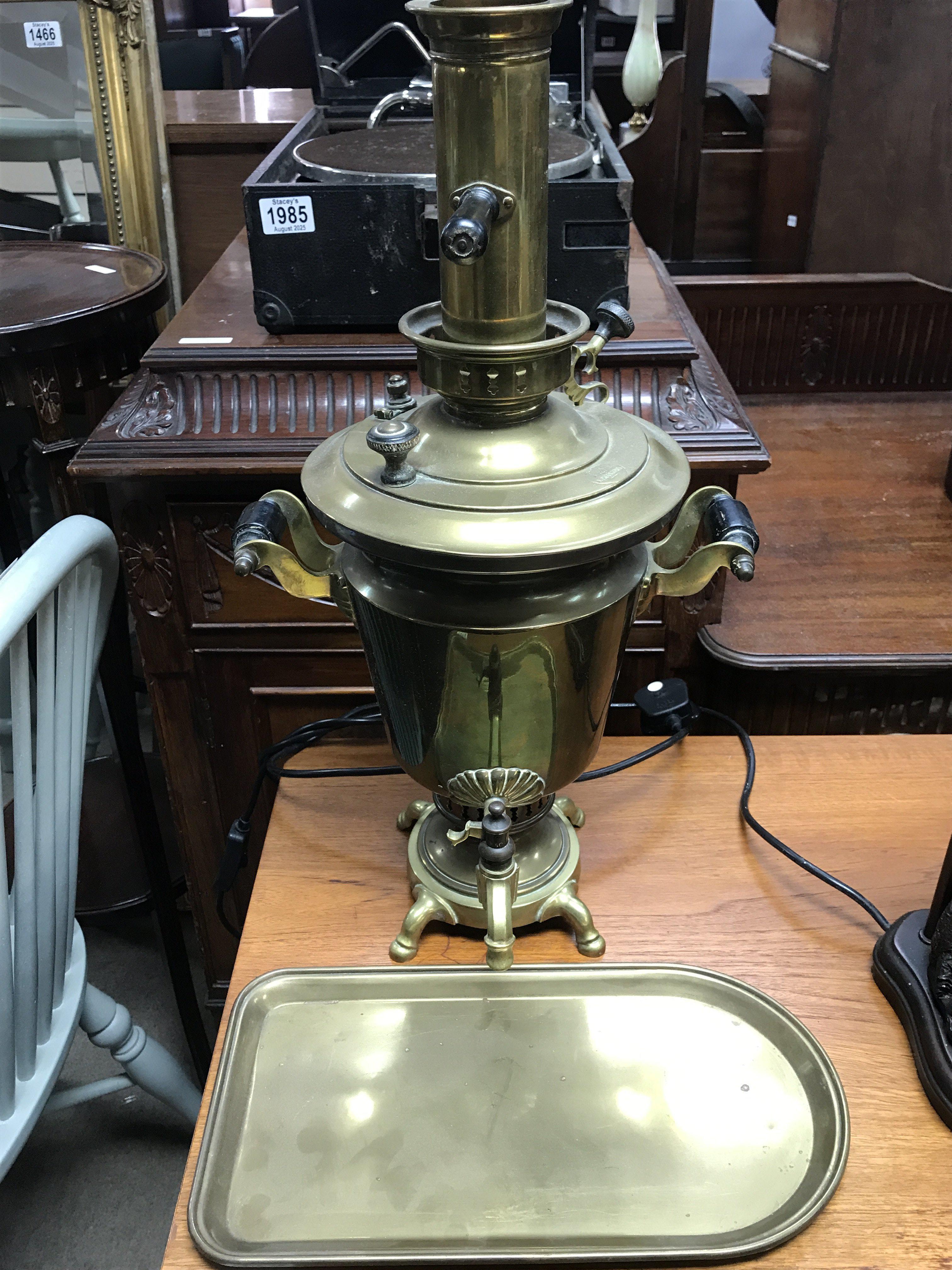 A brass Russian samovar with dish , postage category C
