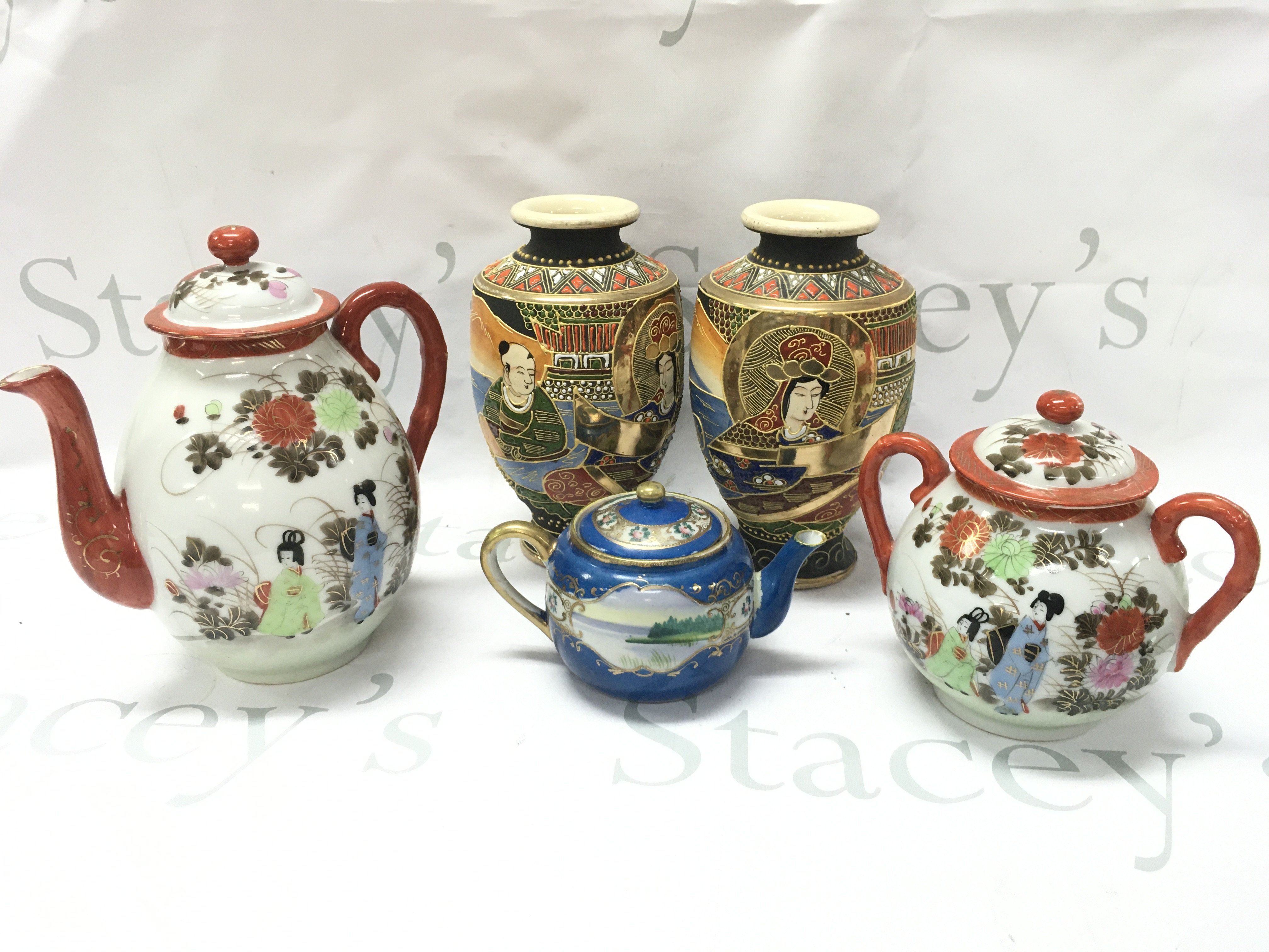 Oriental satsuma vases and teapots. This lot cannot be posted