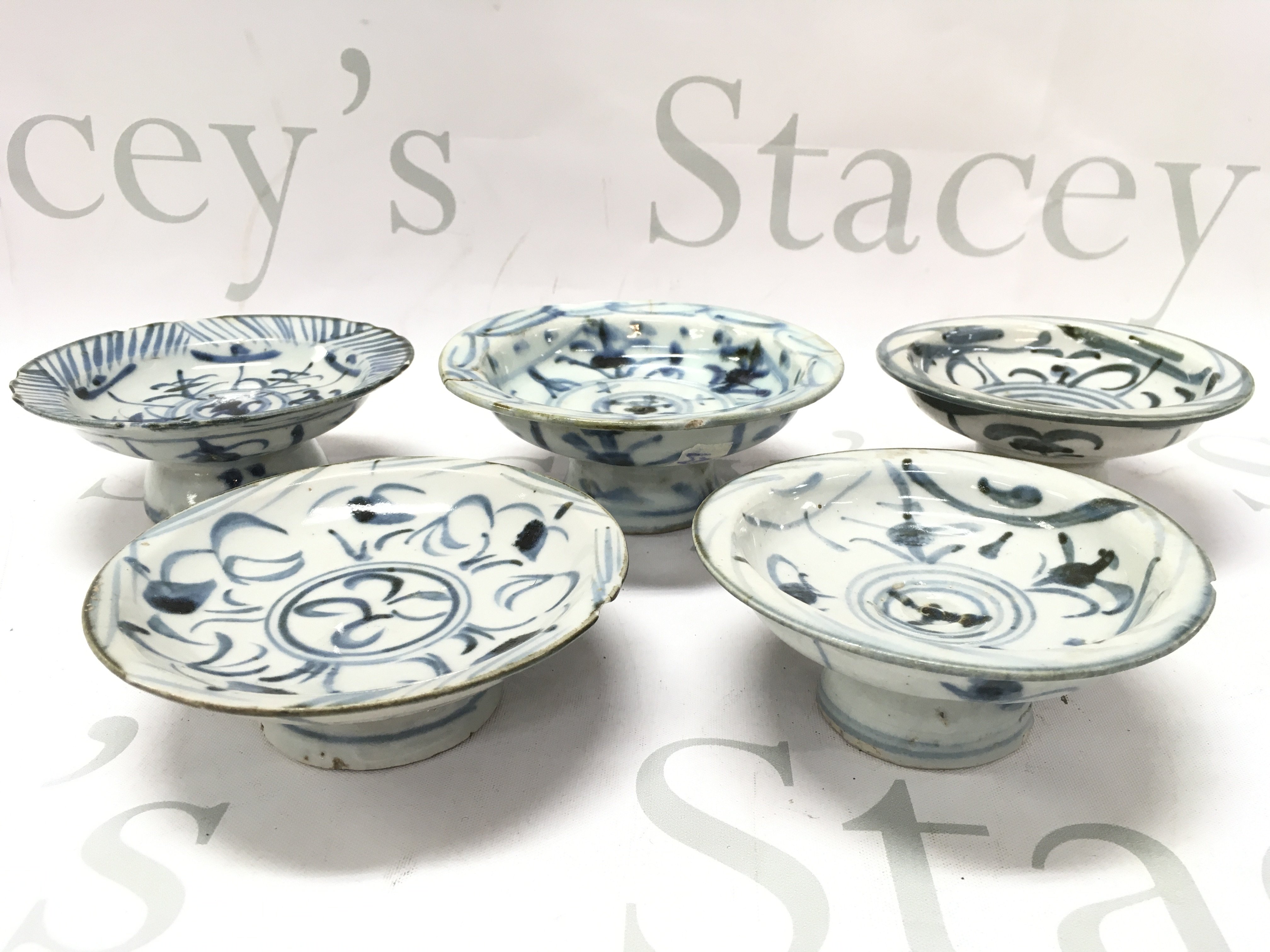 Five Chinese Ming stem bowls , hairline cracks and chips. approximately 2 inches high 4 inches wide. This lot cannot be posted