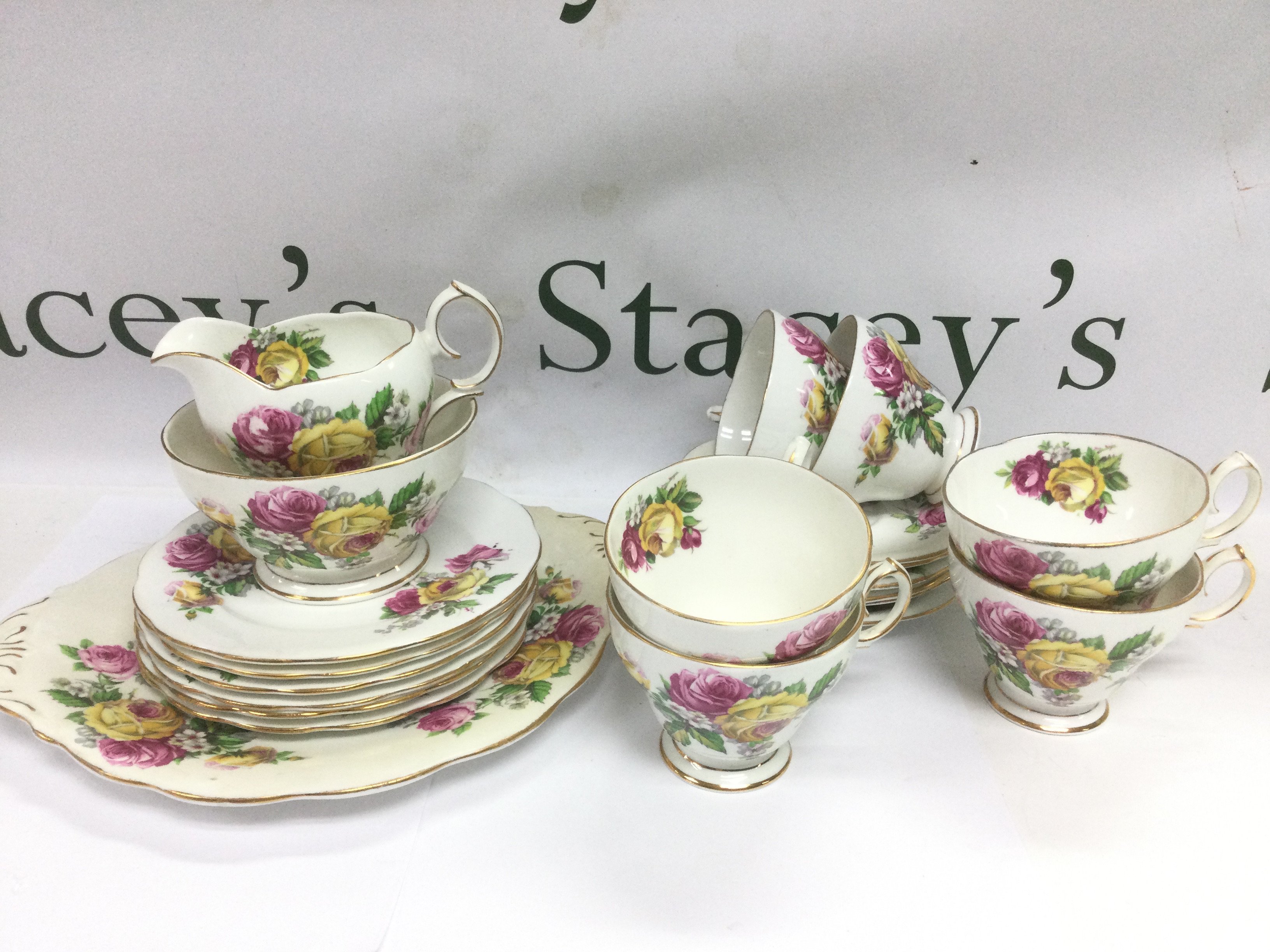 A Queen Anne tea service in Manor Roses pattern plus a J Fryer & Son dinner service. Shipping category D.- NO RESERVE