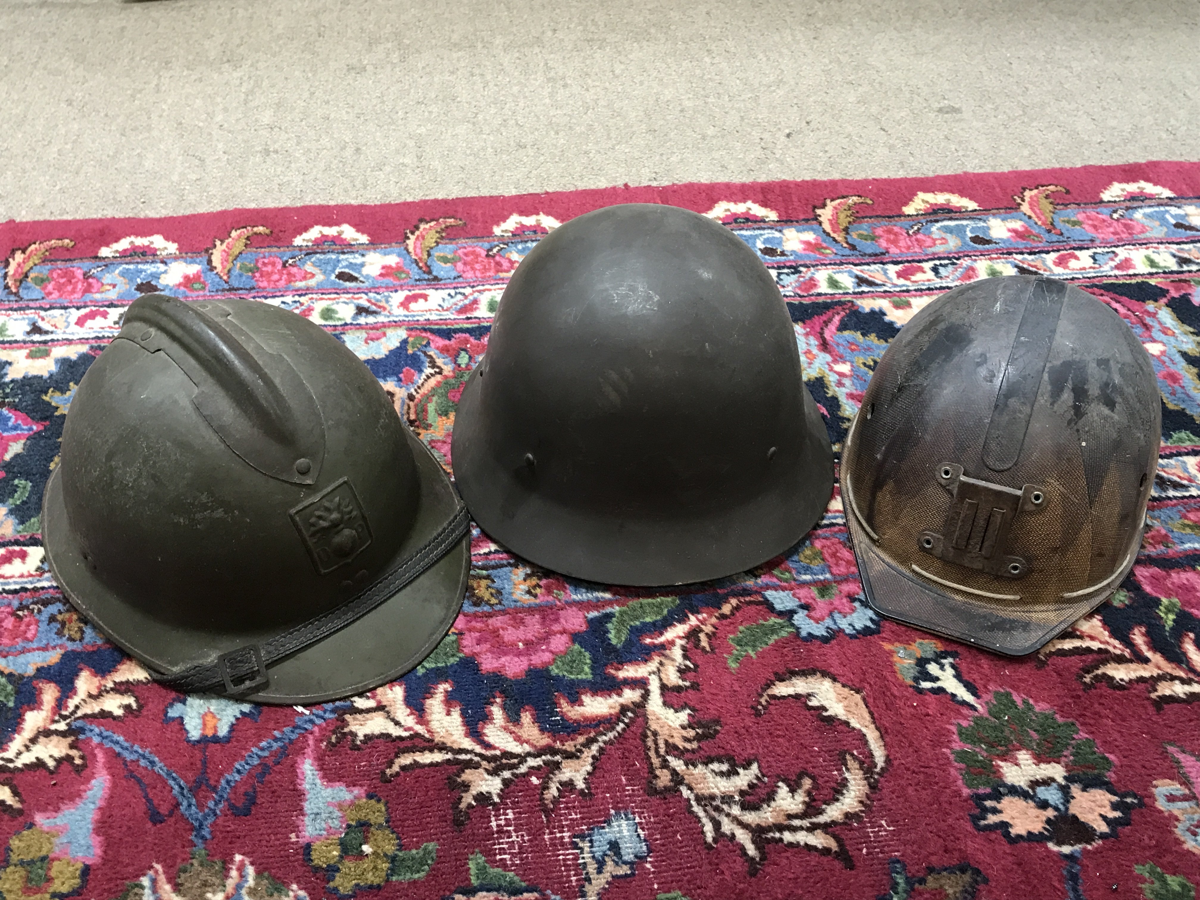 A French Military Fireman helmet a Vintage Miners helmet and a Swedish military helmet (3)