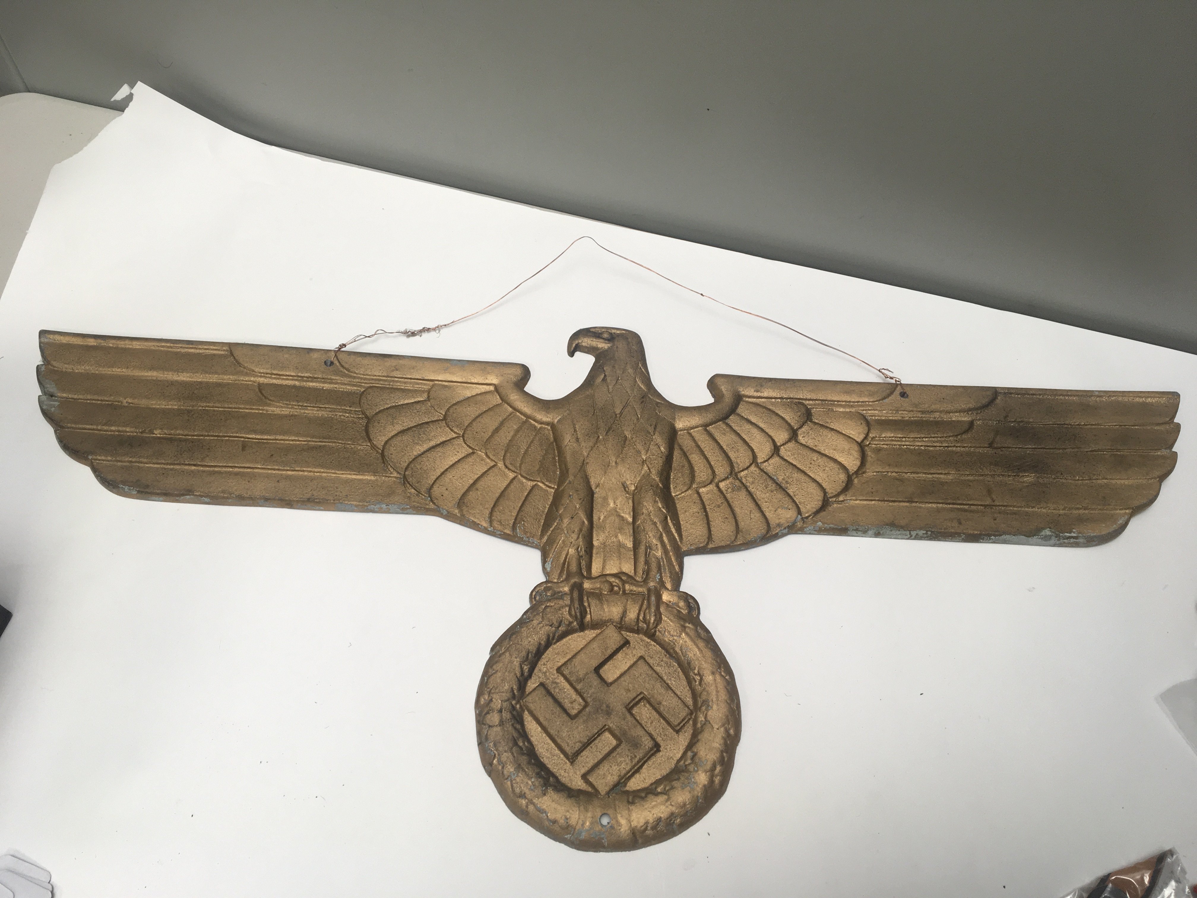 A German Third Reich Richsbahn Aluminium Eagle gold finish the reverse with makers marks these plaques where used extensively displayed on German Trains. It is for the buyer to satisfy themselves before buying as to the authenticity of this lot