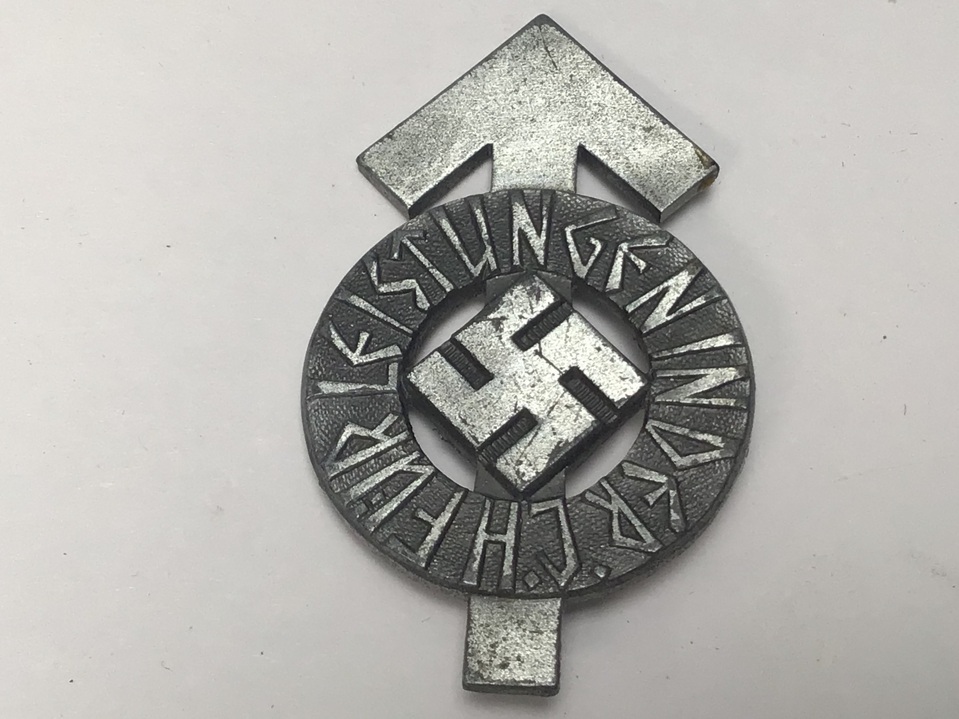 A German Third Reich Hitler Youth Proficiency badge the reverse with makers stamps damaged pin.
