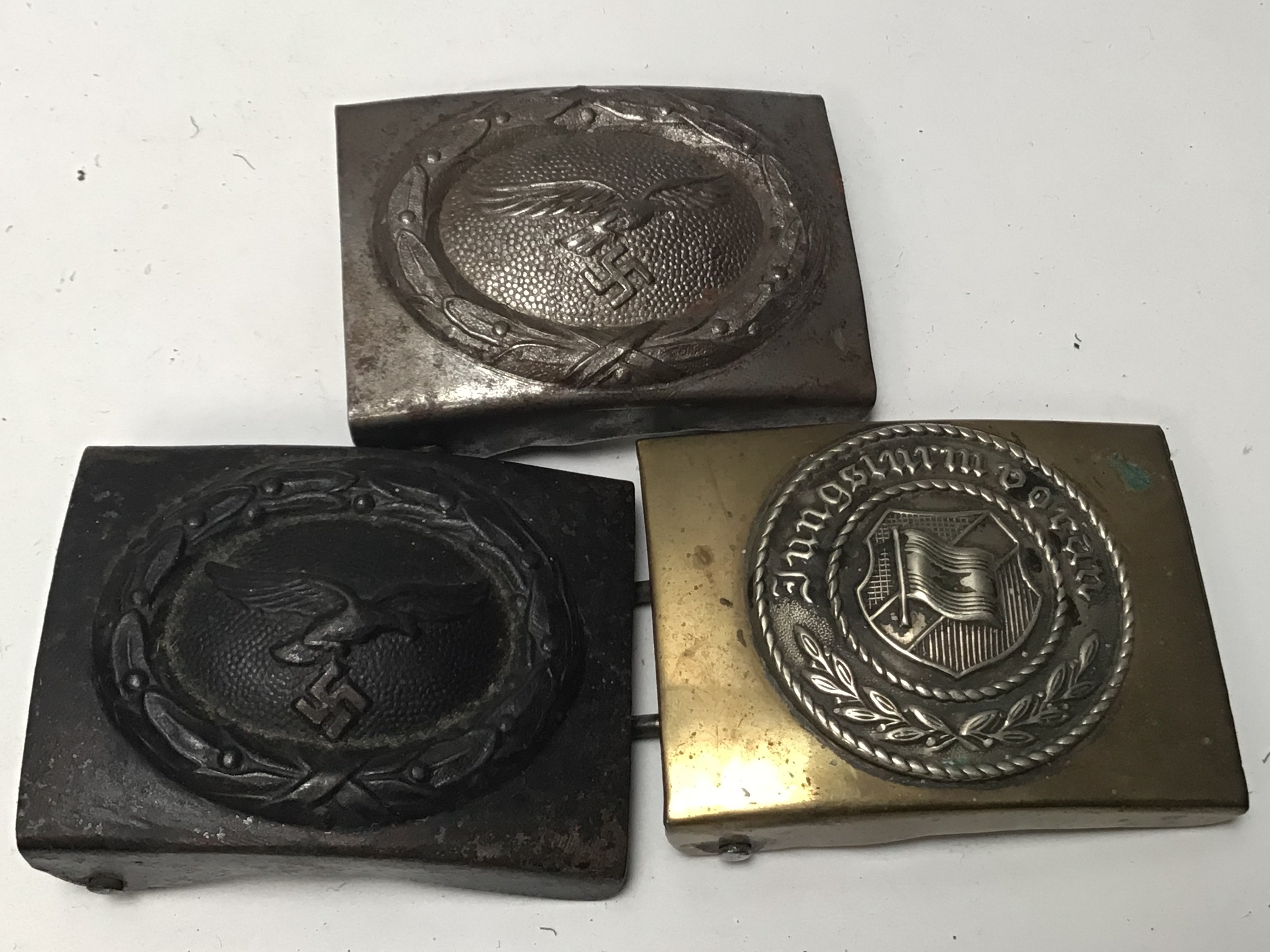 Two German Third Reich Belt buckles two Luffwaffe one with a black finish and a Jungstrum belt buckle (3)