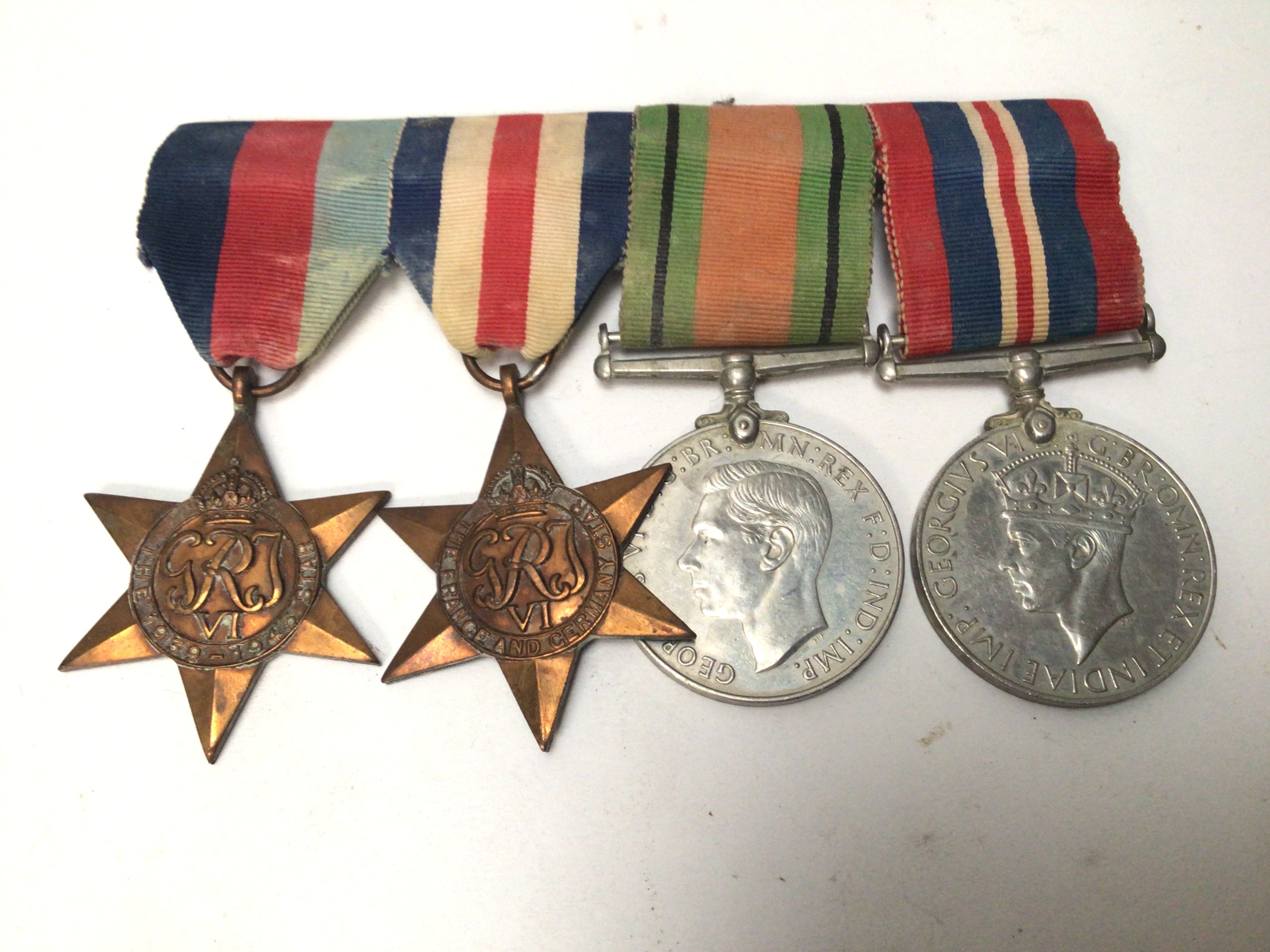 A group of II world war medals 1939-45 star France & German star Defence and Victory medal (4)