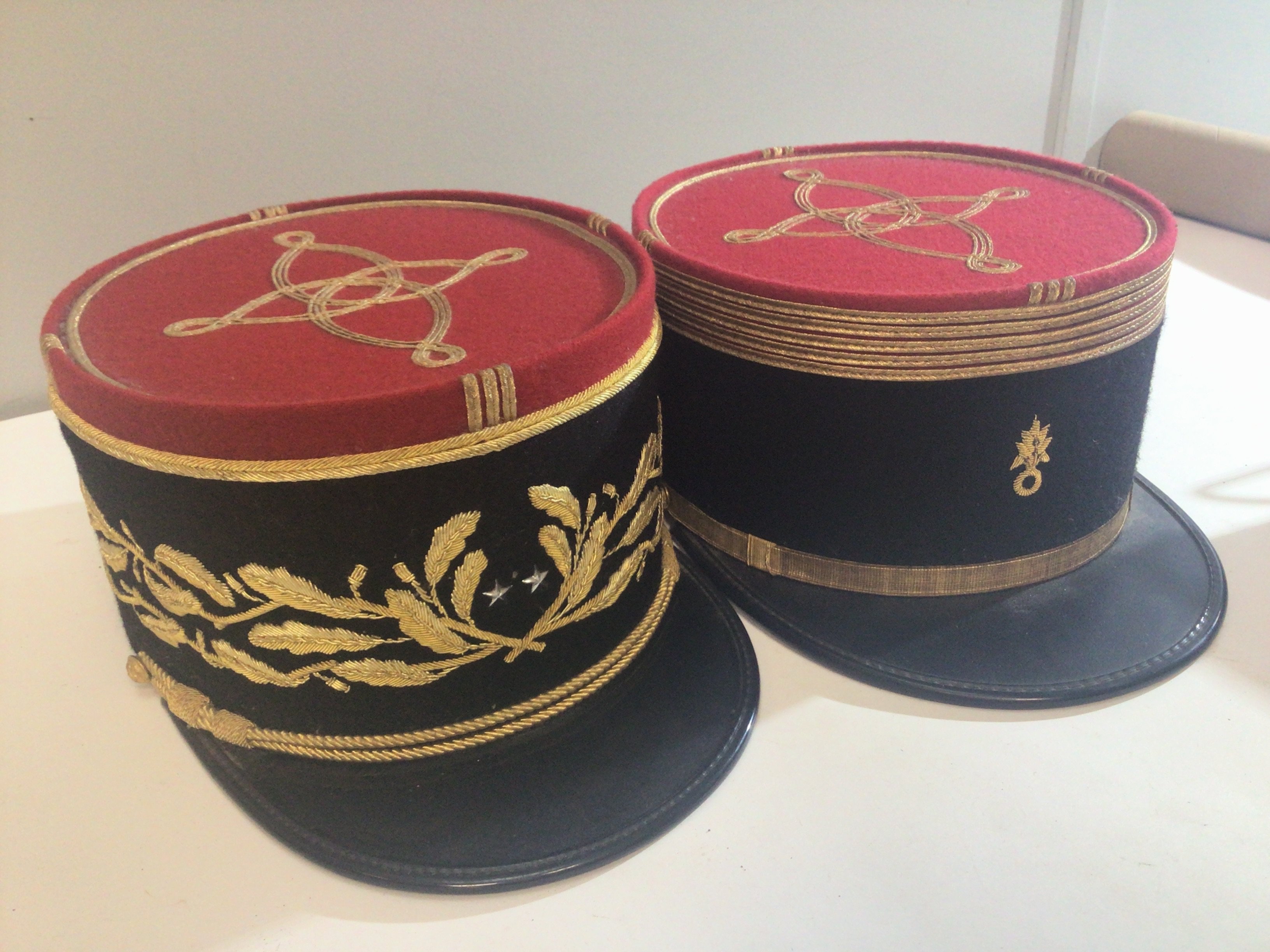 Two French Foreign Legion Kepi hats one with applied gold thread one for a French general with two silver stars.