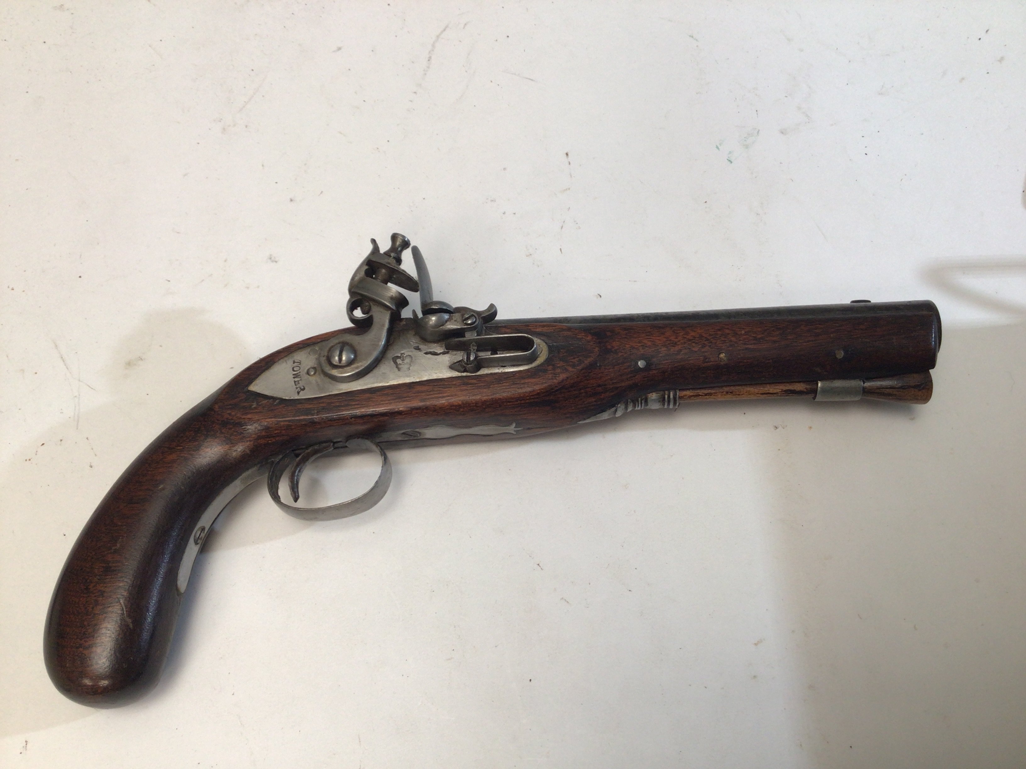 A Flintlock Pistol with steel action Tower Proof marks steel fittings. Length 33cm