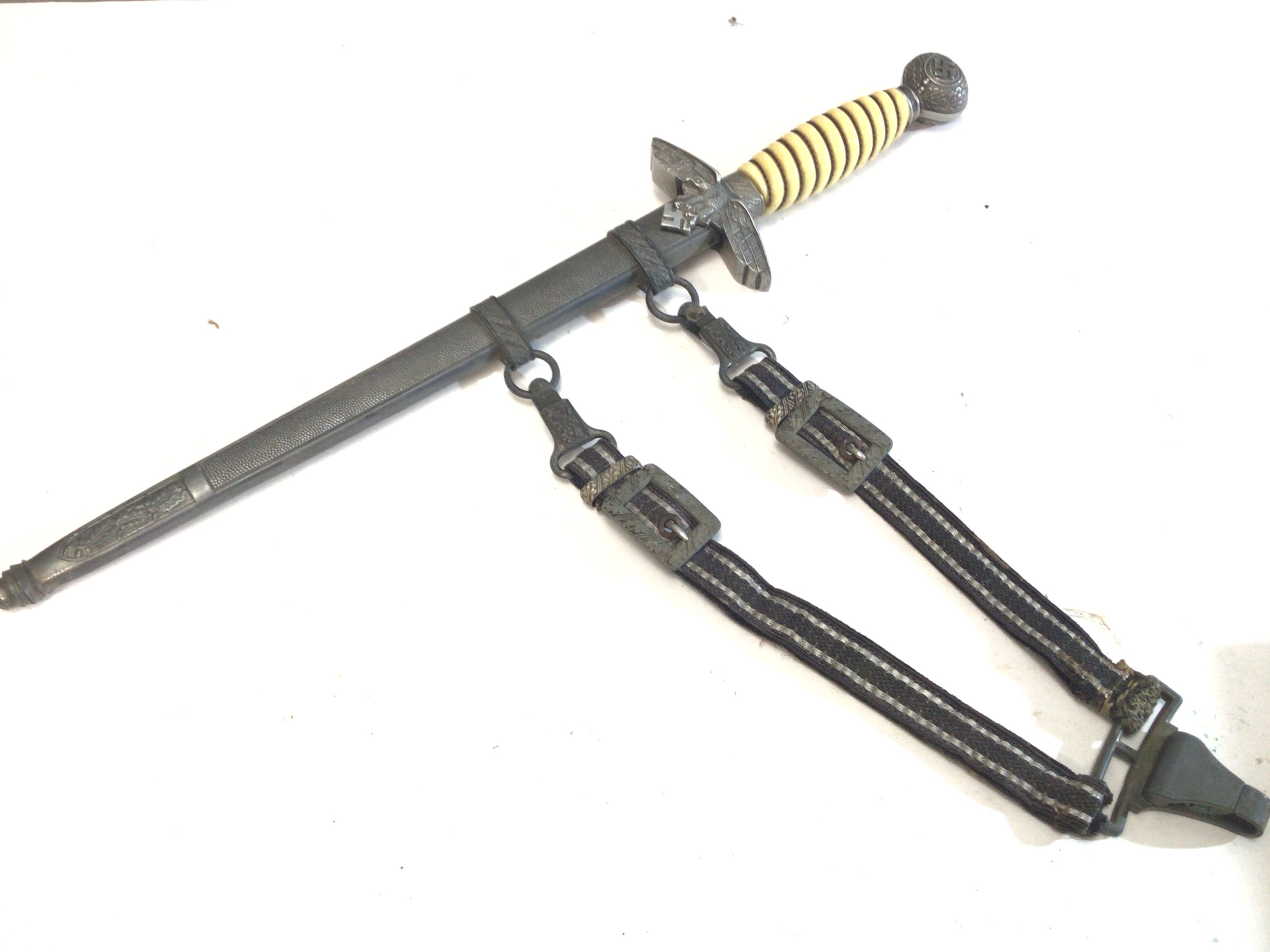 A German Third Reich II world war Luftwaffe presentation officers dagger. With original hanger the blade with Tiger Solingen makers marks.