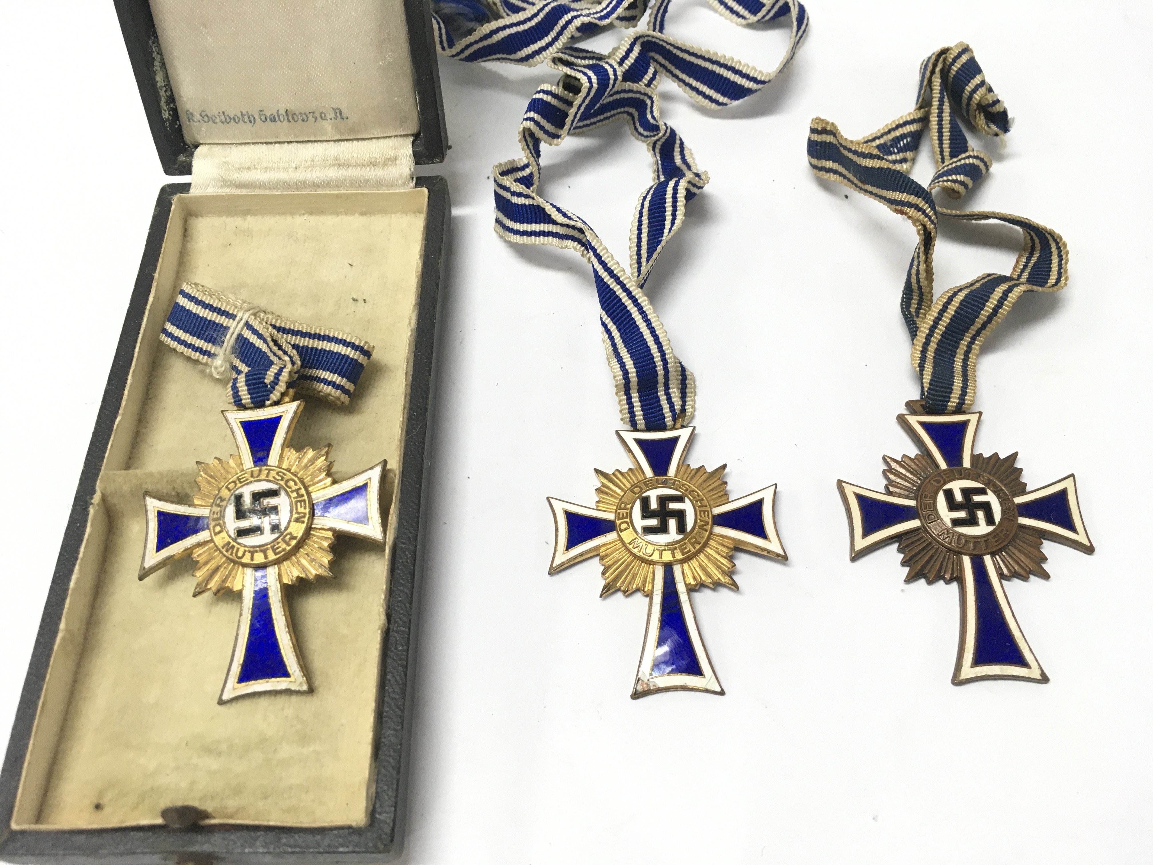 Three German mother of honour crosses. Postage category A