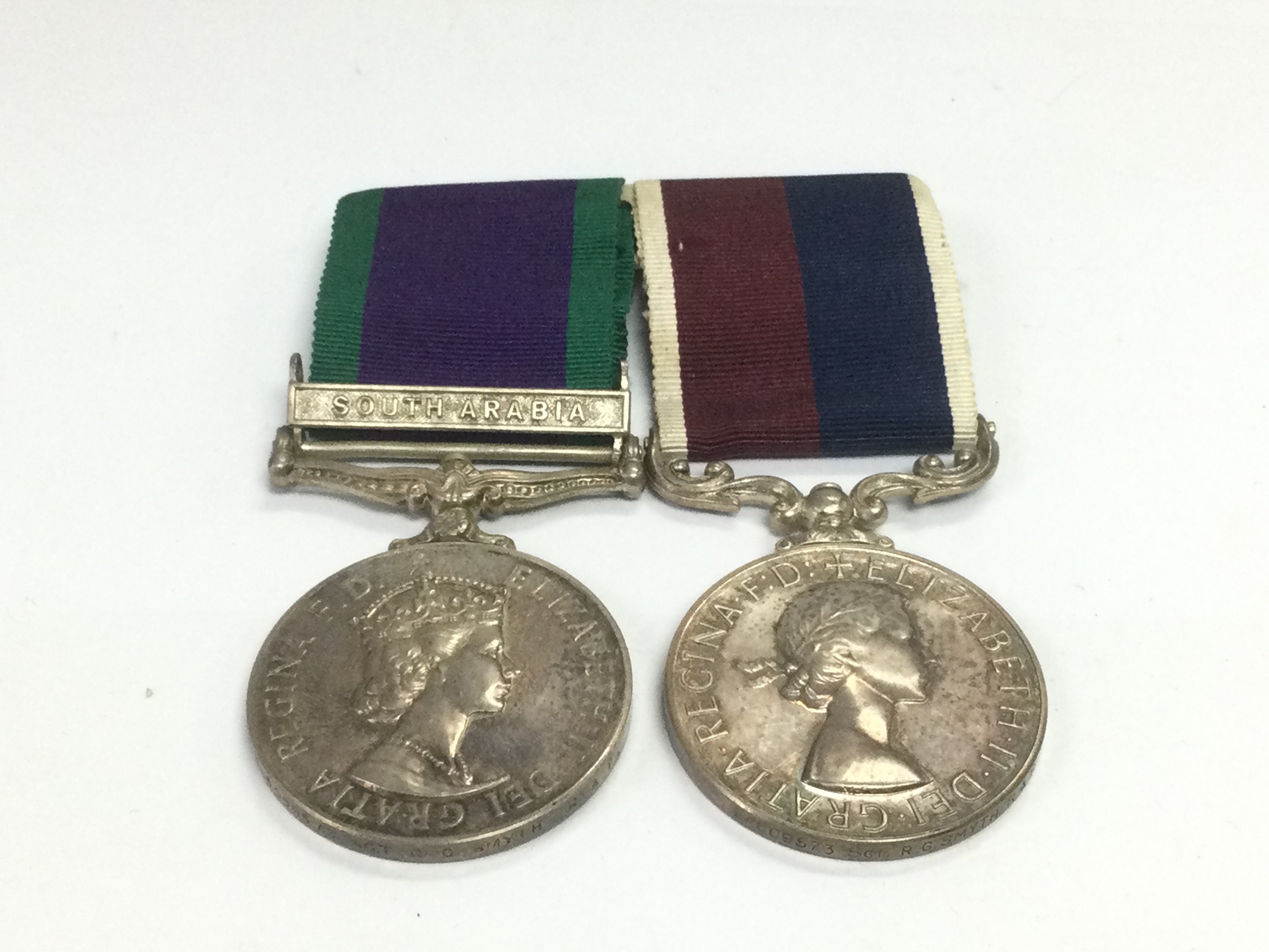 A QE2 good service medal group with South Arabia bar. Shipping category A