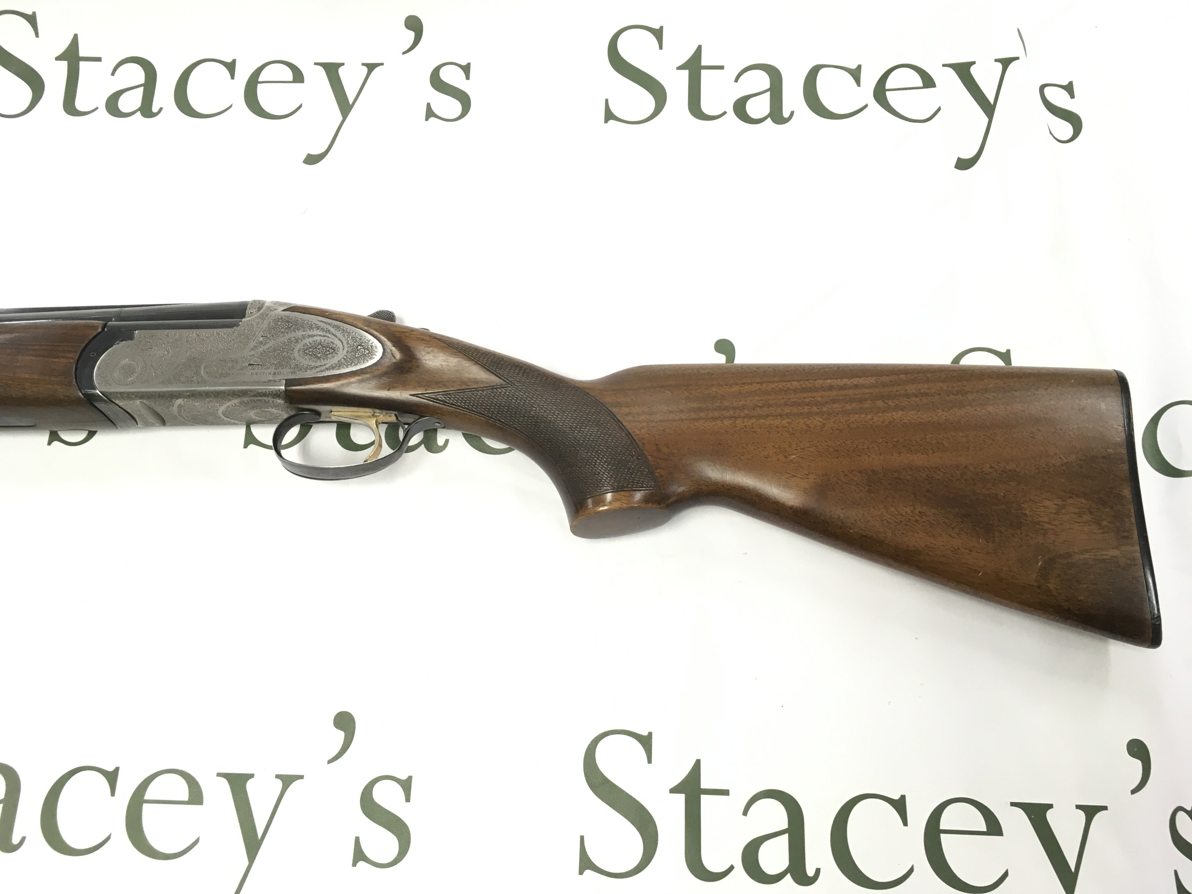 A 12 gauge over under shotgun by ARMI Bettinsoli. Single trigger multi choke. 28 barrel length and 44.5 inches overall. Serial number 63750 PLEASE NOTE THAT A SHOTGUN LICENSE IS REQUIRED TO PURCHASE THIS ITEM. COLLECTION AND VIEWING BY APPOINTMENT ONLY.