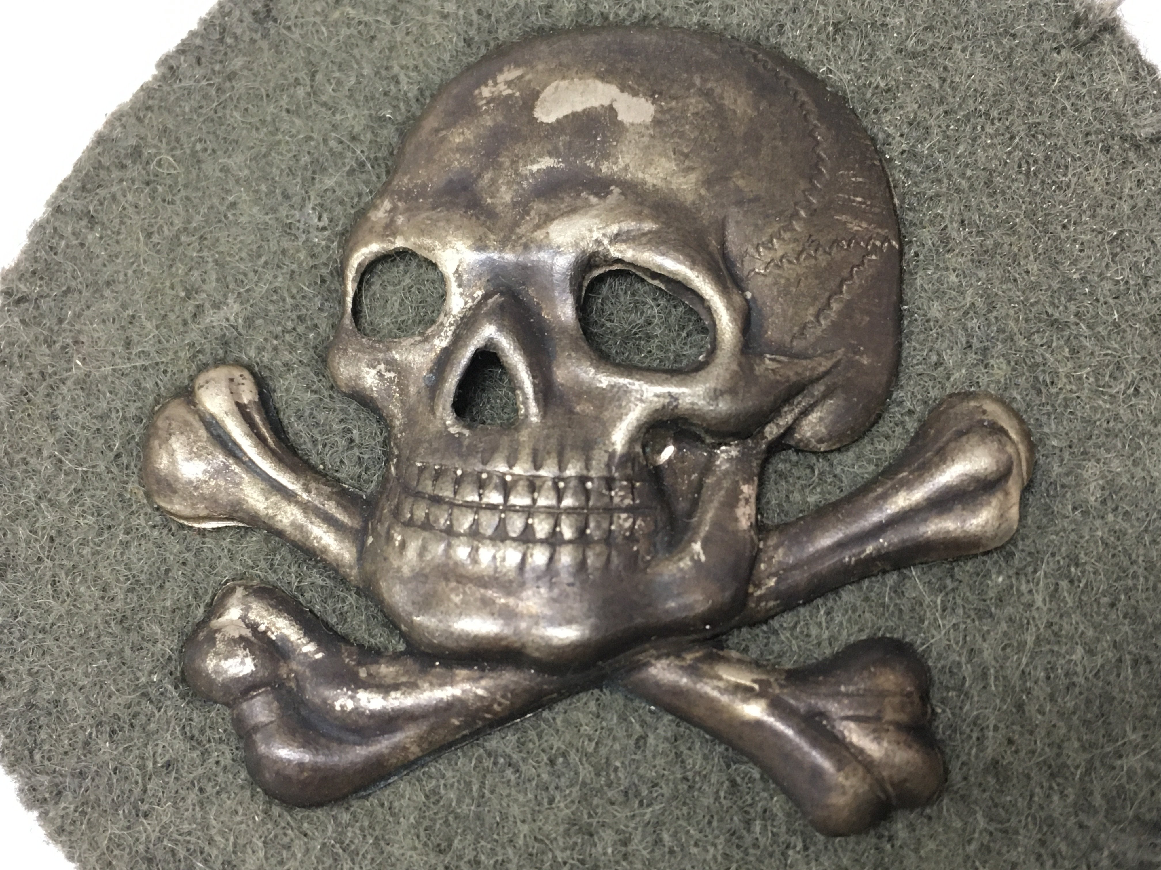 A WW1 German Flammenwerfer (Flame Thrower) Officers sleeve Badge and a WW2 Third Reich SS signals badge . Postage category A NO RESERVE