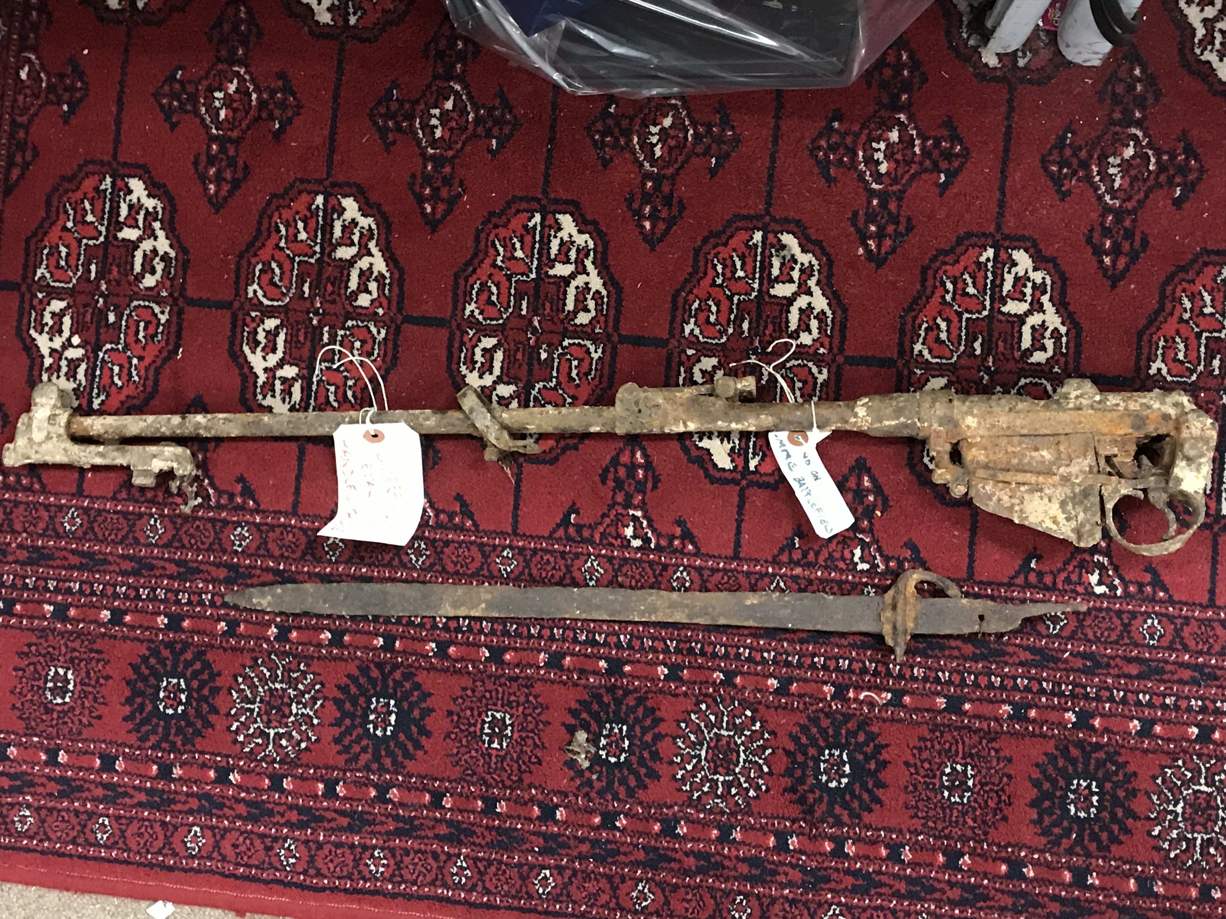 A WW1 rediscovered relic retrieved from the ground of the Somme battle field, possibly an Enfield 303 rifle with bayonet. This lot cannot be posted